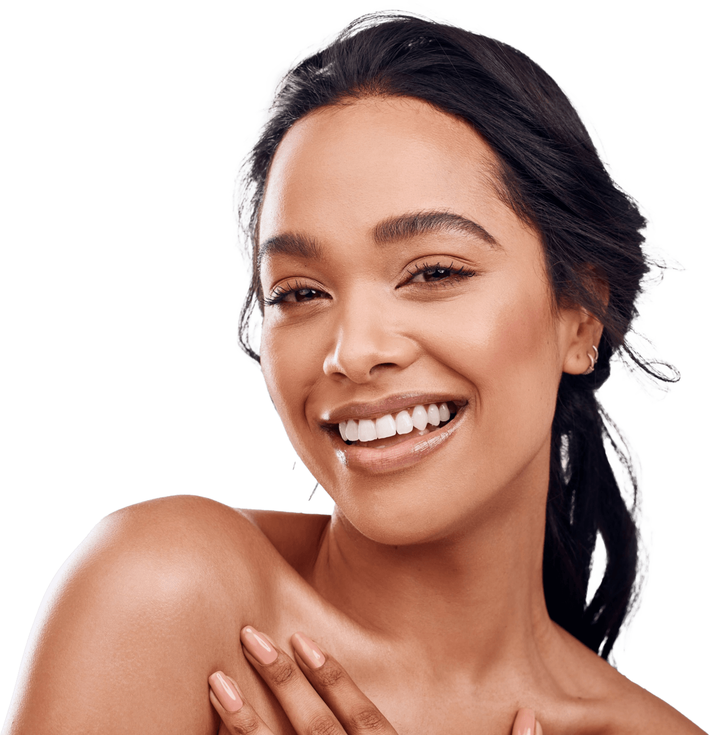 Smiling patient with clear, even skin resting one hand on her shoulder